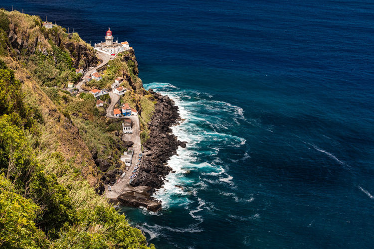 The fantastic view of the lighthouse from nordeste on the coast of the azores island of são miguel