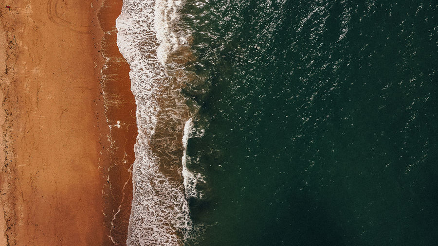 Full frame shot of sea waves on beach