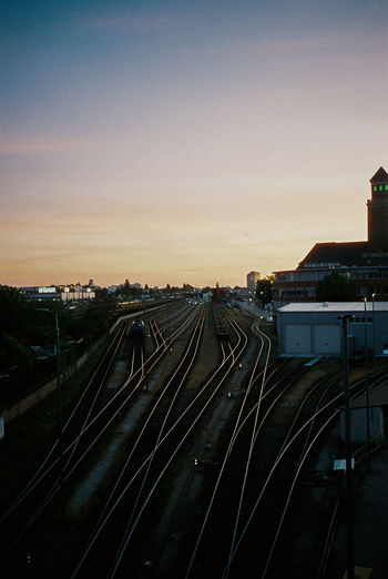 High angle view of train against sky at sunset