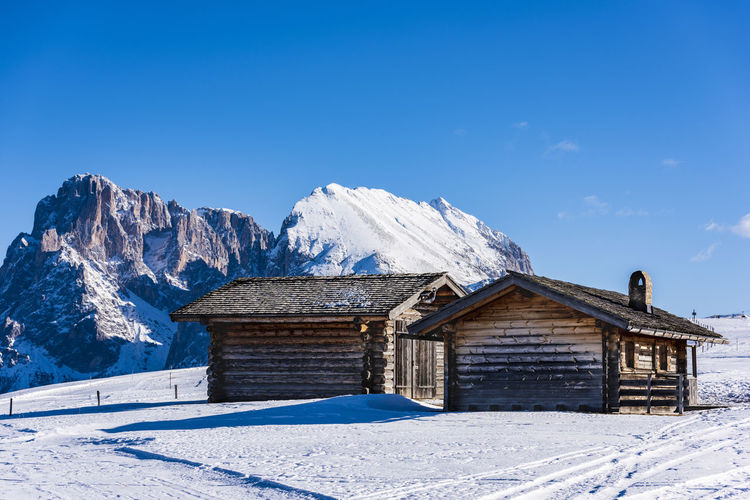Dream huts on the alpe di siusi. in the white. dolomites, italy