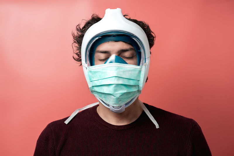 Man with mask and underwater mask to protect himself from pandemic