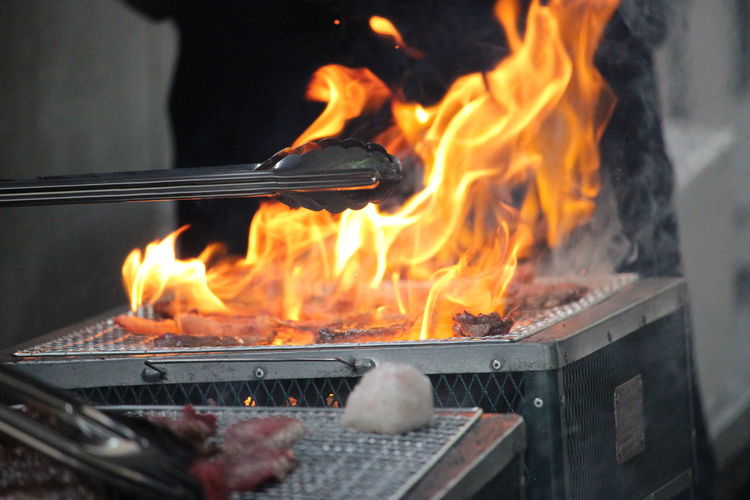 Close-up of fire on barbecue grill