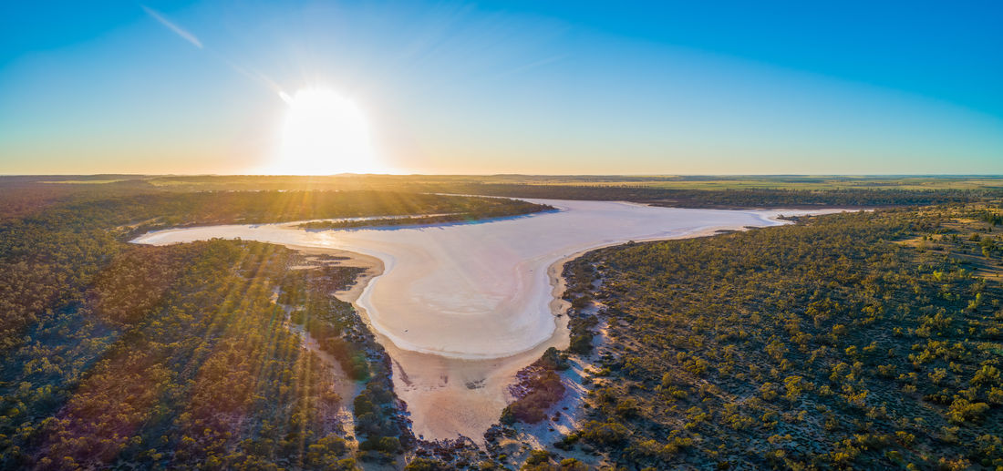 Panoramic view of land against sky during sunset