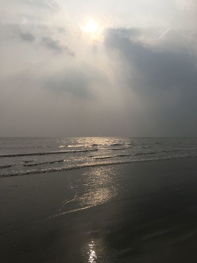 Scenic view of sea against sky at sunset