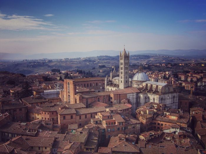 Aerial view of cityscape with siena cathedral