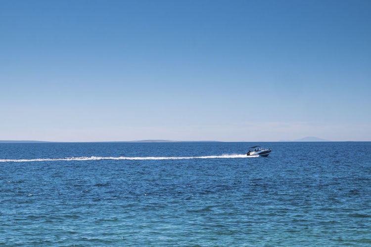 High speed boat on a clear, blue, sea. vir, zadar contry, croatia