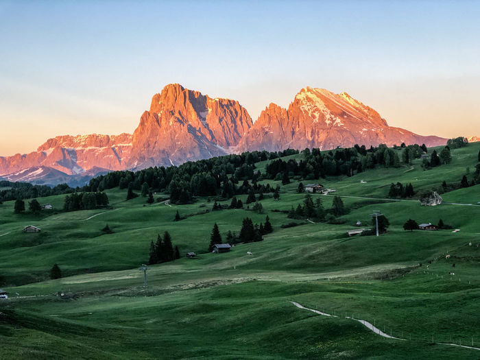 Scenic view of landscape and mountains against sky