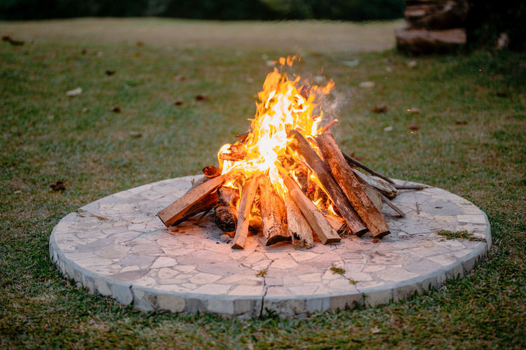 Bonfire on wood in field