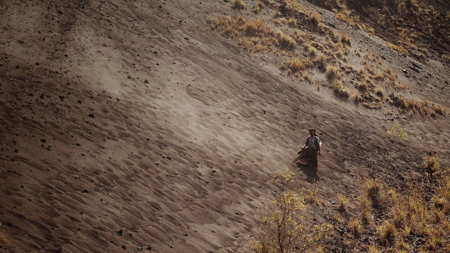 High angle view of man walking on land