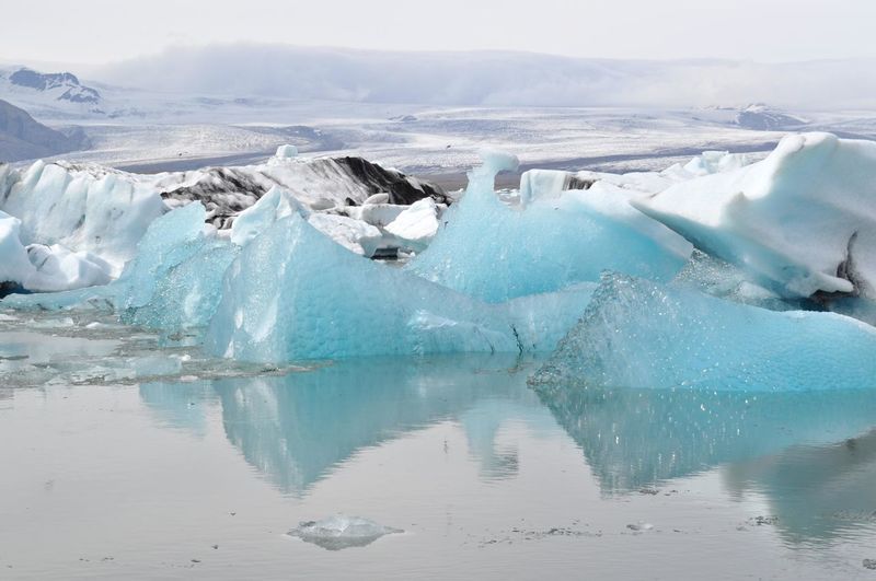 Icebergs floating on sea during winter