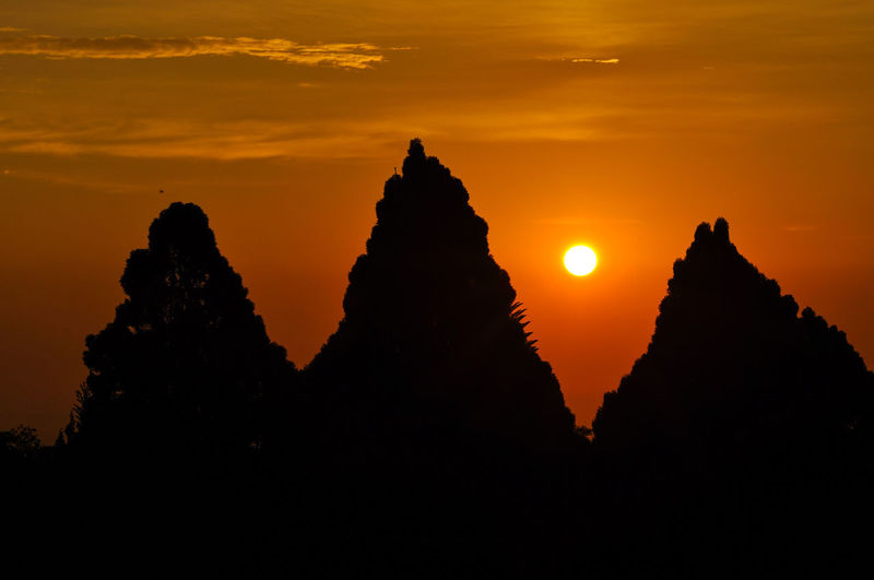 Silhouette of rock during sunset