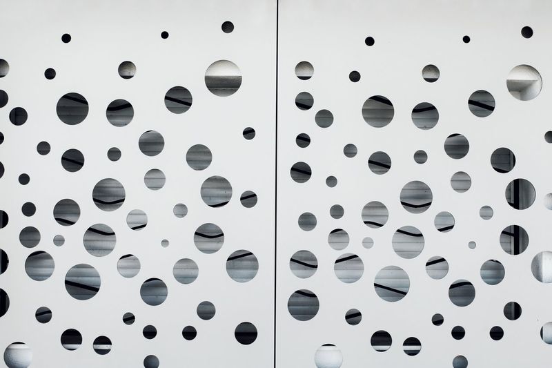 Close-up of holes in sheet metal