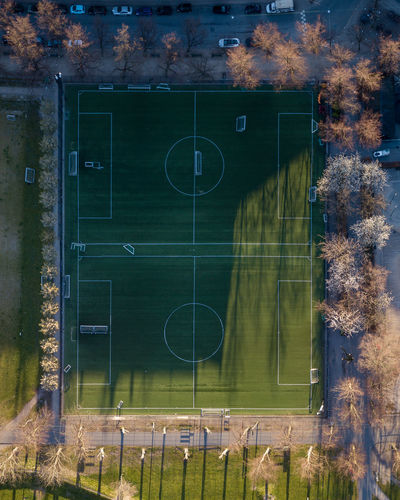 View of soccer field against buildings