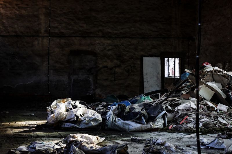 Abandoned garbage by building