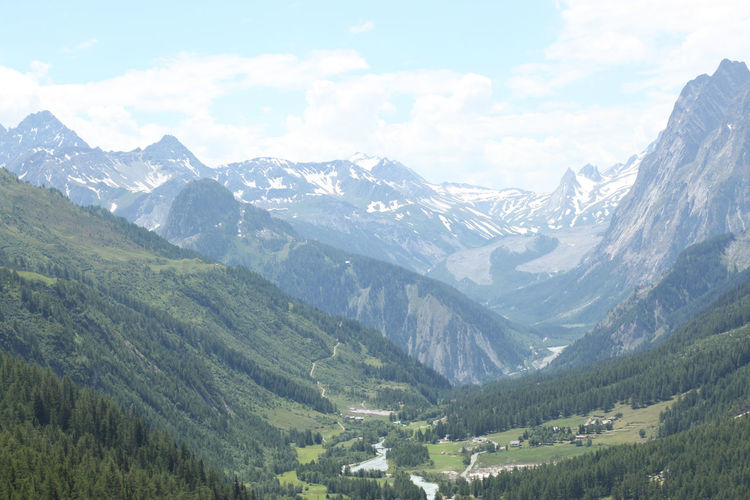 Scenic view of snowcapped mountains against sky