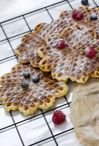 Close-up of waffles on metal grate