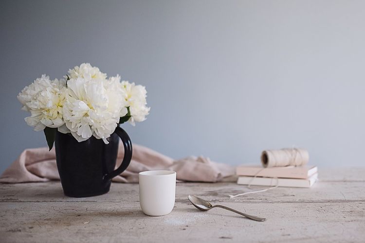 Close-up of flower vase on table
