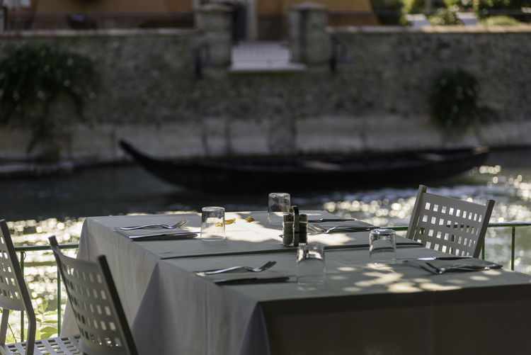 Tables and chairs in restaurant