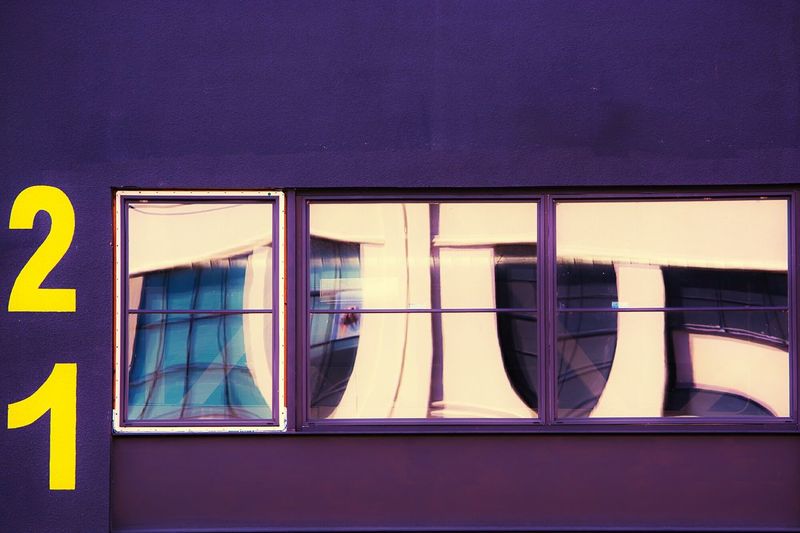 Close-up of windows of purple building