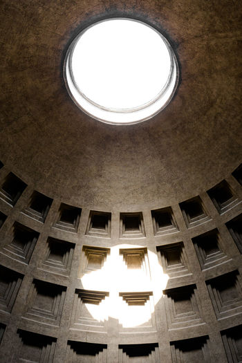 Low angle view of illuminated ceiling