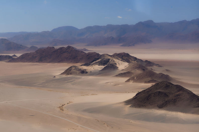 Scenic view of desert against sky
