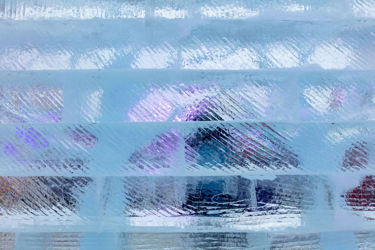 Digital composite image of woman on glass window