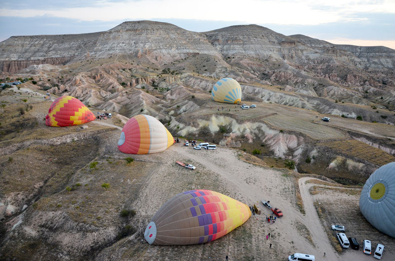 Multi colored hot air balloons on rock