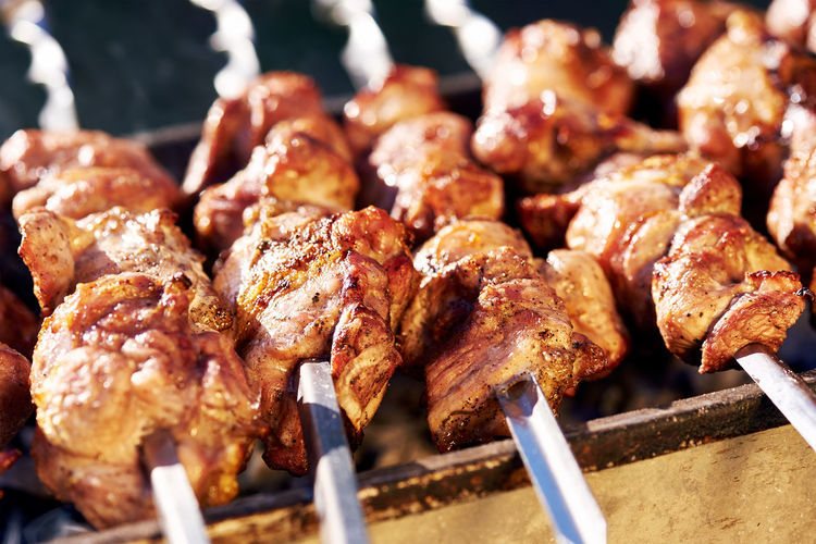 Close-up of meat on barbecue grill
