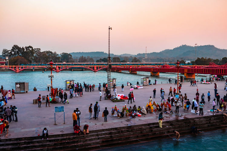 Ganges river bank with devotee crowed at evening from flat angle