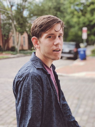 Portrait of young man looking away