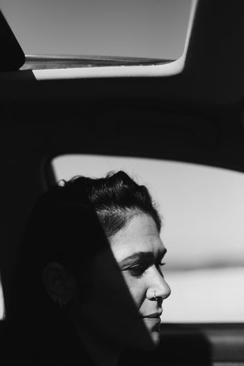Portrait of a woman in car