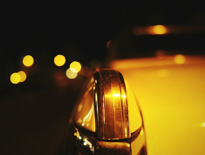 Car parked on street at night