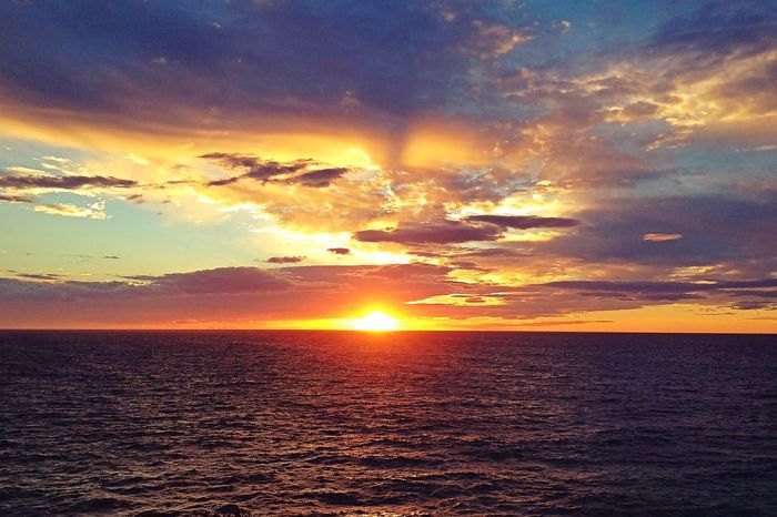 Colorful sunset over sea horizon
