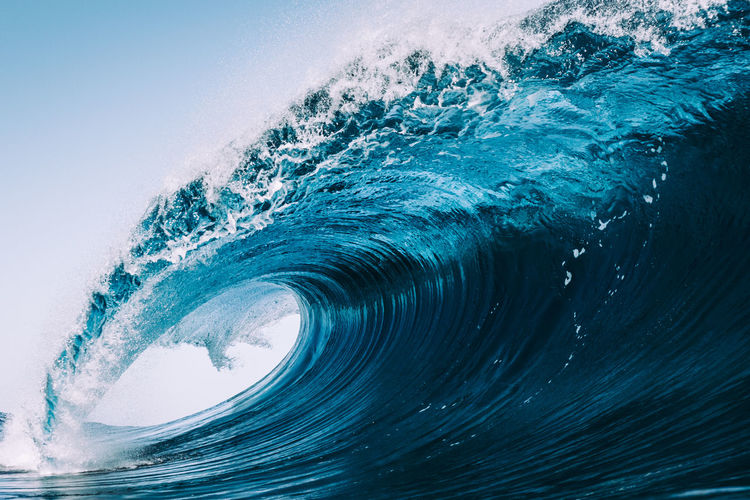 Scenic view of sea wave against clear sky