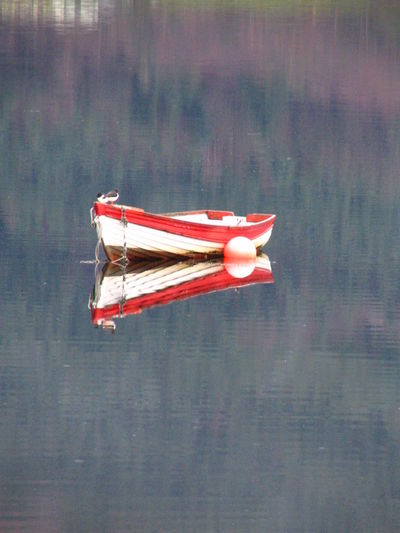 Close-up of boats in water