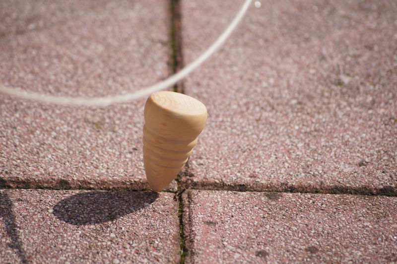 Close-up high angle view of spinning top