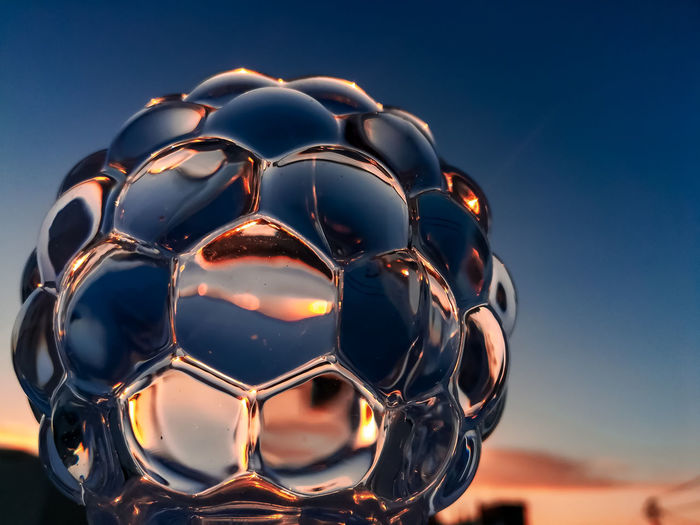 Close-up of ball against clear blue sky