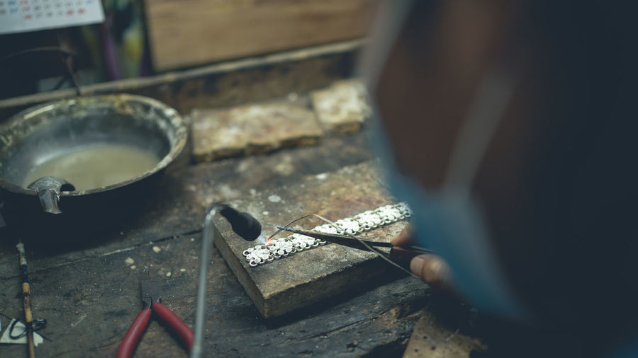 High angle view of man working on floor
