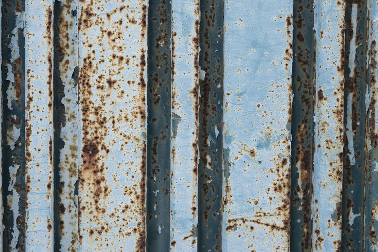Old rusty metal texture background with paint flaking and cracking texture.