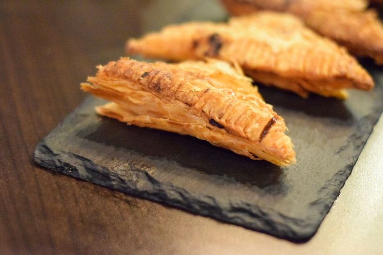Close-up of tuna puffs on table