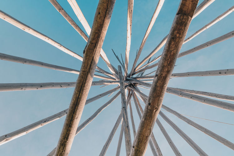 Low angle view of bamboo structure against sky