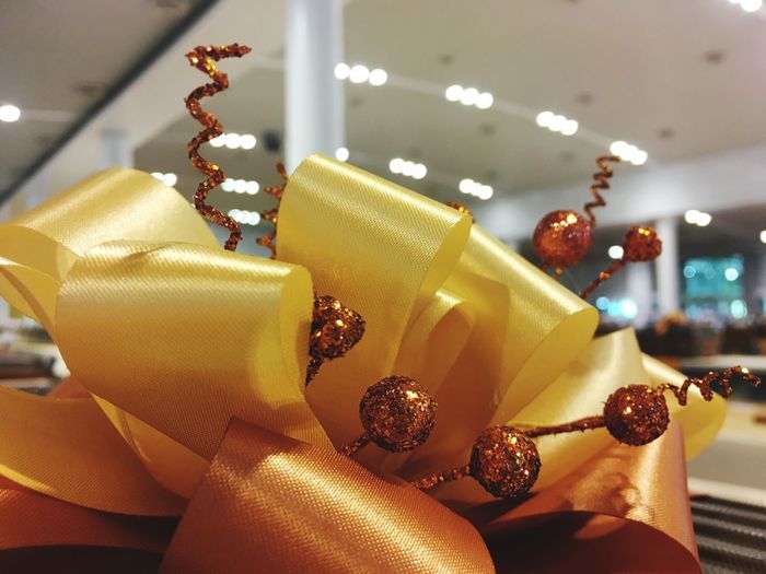 Close-up of gold ribbon decoration