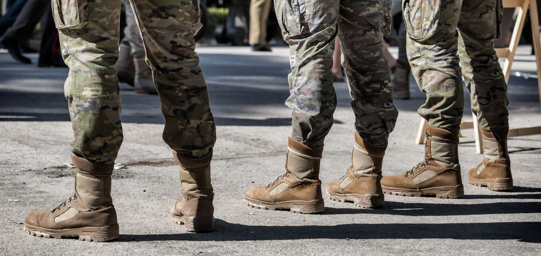 Low section of soldiers standing outdoors