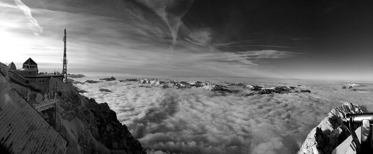 Idyllic shot of clouds over snowcapped mountains seen from zugspitze against sky