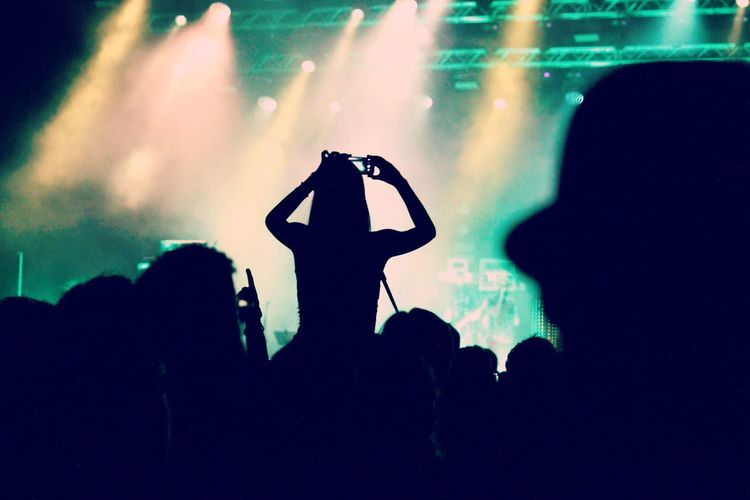 Silhouette of people in nightclub