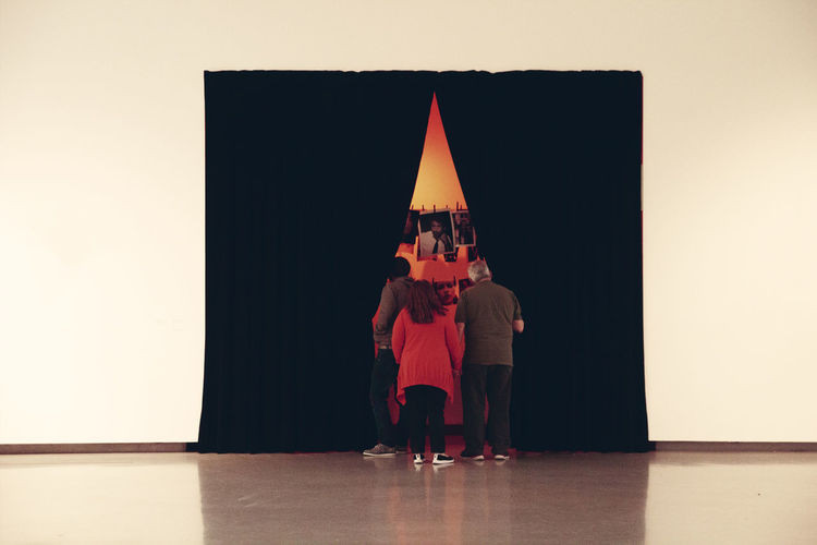 High angle view of people standing on floor