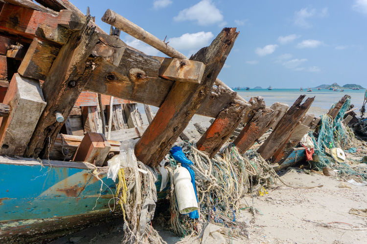 Panoramic view of abandoned boat on beach