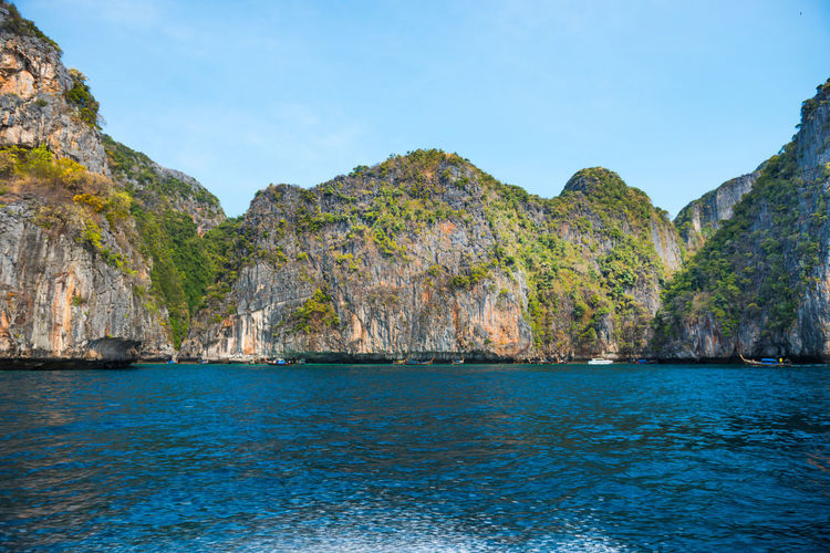 Panorama of famous phi phi island in thailand with sea, boats in lagoon the beach movie was filmed