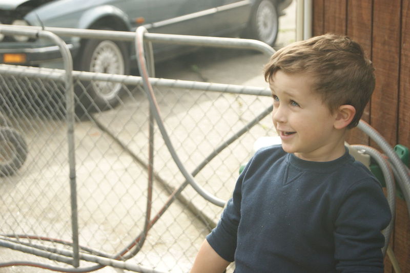 Close-up of boy standing outdoors