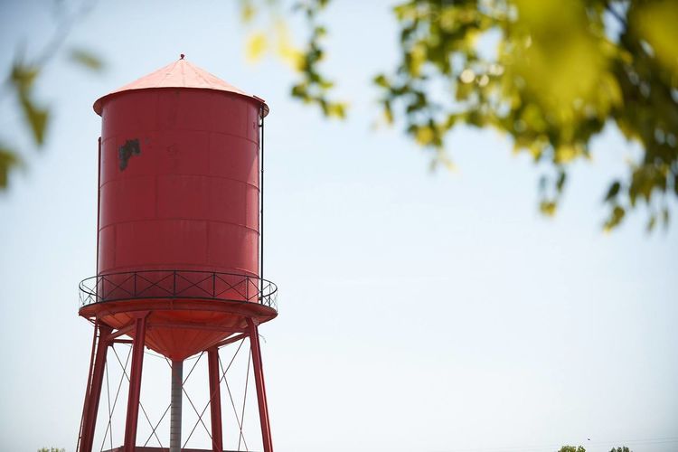 High section of storage tank against sky